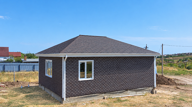Дом из СИП-панелей 9,6 × 9,1 м, одноэтажный